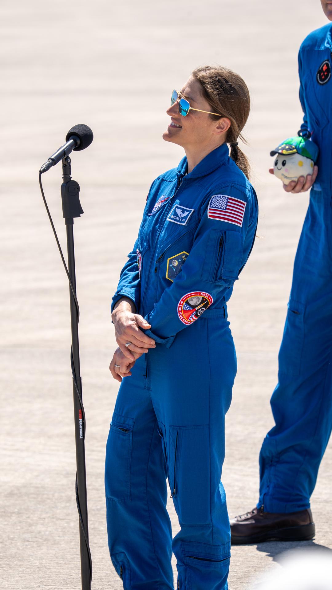 These images show the moments shortly after the arrival of the Artemis II crew to NASA’s Kennedy Space Center on March 27, 2026 ahead of the launch. The four astronauts, Victor Glover, Reid Wiseman, Christina Koch, and Jeremy Hansen, arrived on a T38, which can be seen behind them. They took turns speaking to the crowd as they also announced the zero-gravity indicator they would be taking with them on their journey.